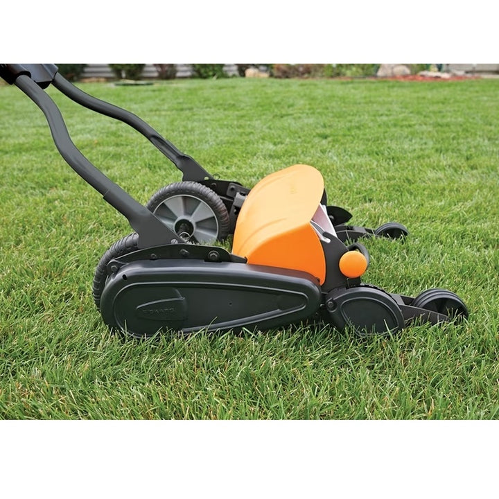 Fiskars reel mower cutting height best sale